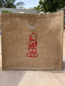Jute tote bag with Handala hand-embroidery, showcasing its eco-friendly material and craftsmanship.