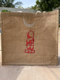 Jute tote bag with Handala hand-embroidery, showcasing its eco-friendly material and craftsmanship.