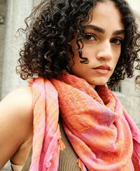 Mary Cotton Keffiyeh with hand-embroidered Ibrahim pattern, showcasing its earthy tones and craftsmanship.