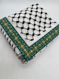 Two traditional Palestinian keffiyehs on a white background